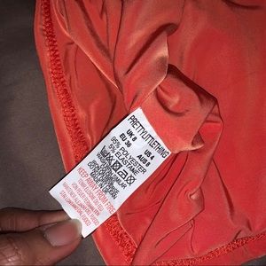 shape orange slinky lace up back bodycon dress